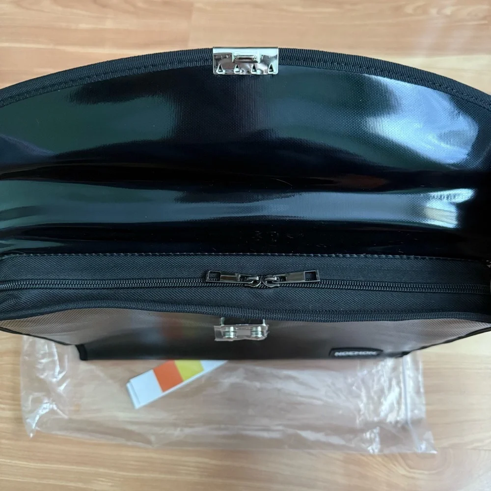 Noemon Black Briefcase Bag – New, 25 Pockets, Never Used
